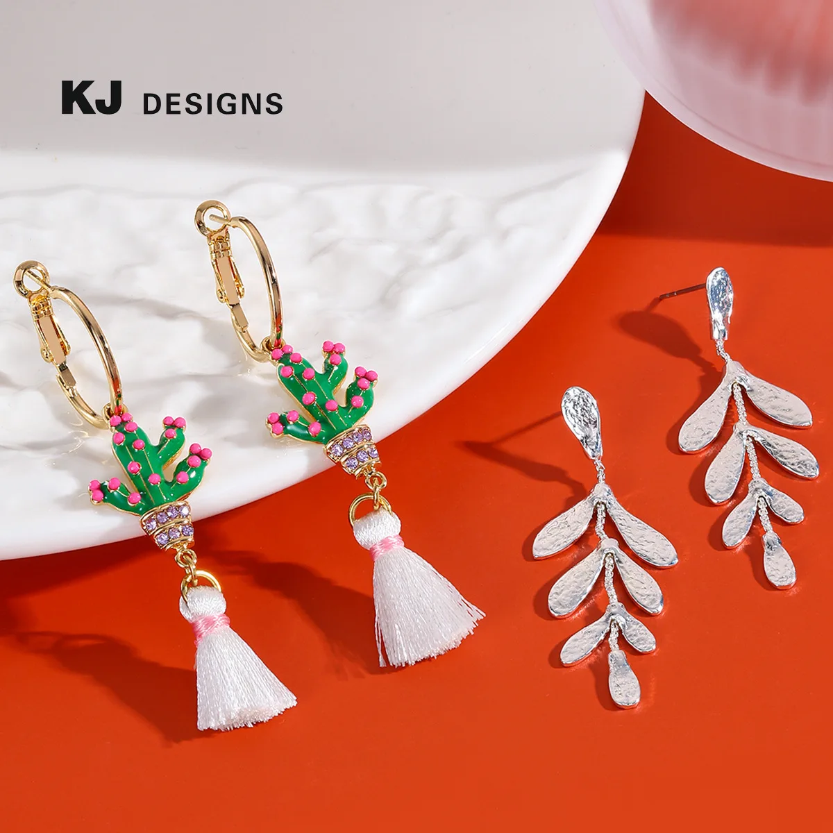 Kenjie cross-border leaf cactus fringed stud earrings female metal wind long individual cold wind temperament treatment