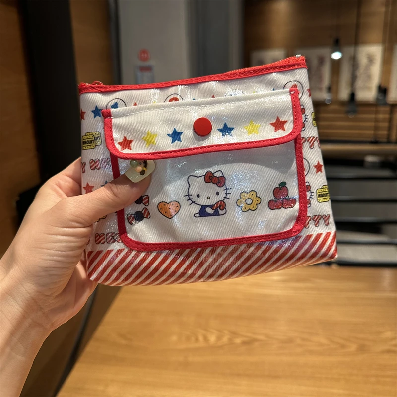 

Japanese hello kitty cute cartoon love hand holding makeup bag ID bag change headphone lipstick portable storage bag Lady