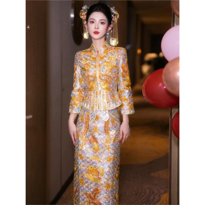 

The new style of dragon and phoenix bridal gown a Chinese-style wedding dress is heavy form-fitting toasting