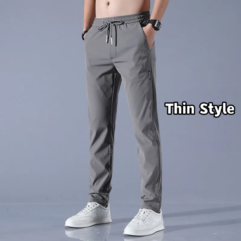 Autumn Pants Men Fitness Sportswear Tracksuit Elastic Waist Sweatpants Cotton Trousers Loose Gyms Jogger Track Pants Mens M- 5XL