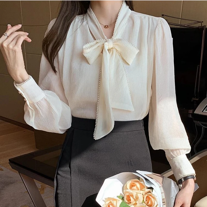 อารมณ์แขนยาวหลวมเสื้อแนวโน้ม Bow Lacing All-Match Elegant เสื้อฤดูใบไม้ผลิแฟชั่นผู้หญิงเกาหลีเสื้อผ้า