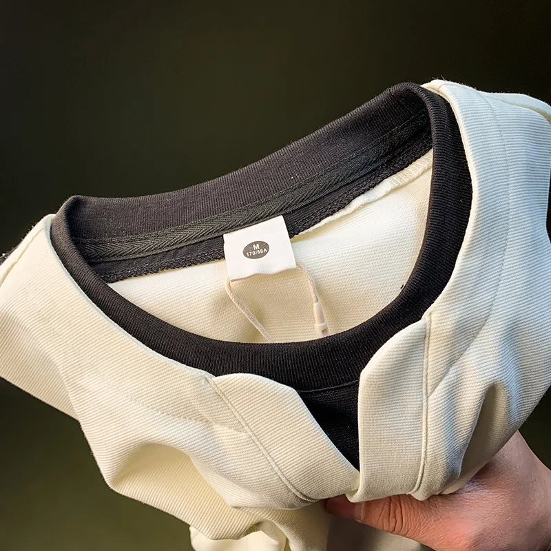 ฤดูร้อนเสื้อยืดผู้ชายอินเทรนด์ถักปักคอวีปลอมสองชิ้นซ้อนแขนสั้นระบายอากาศบางด้านบน