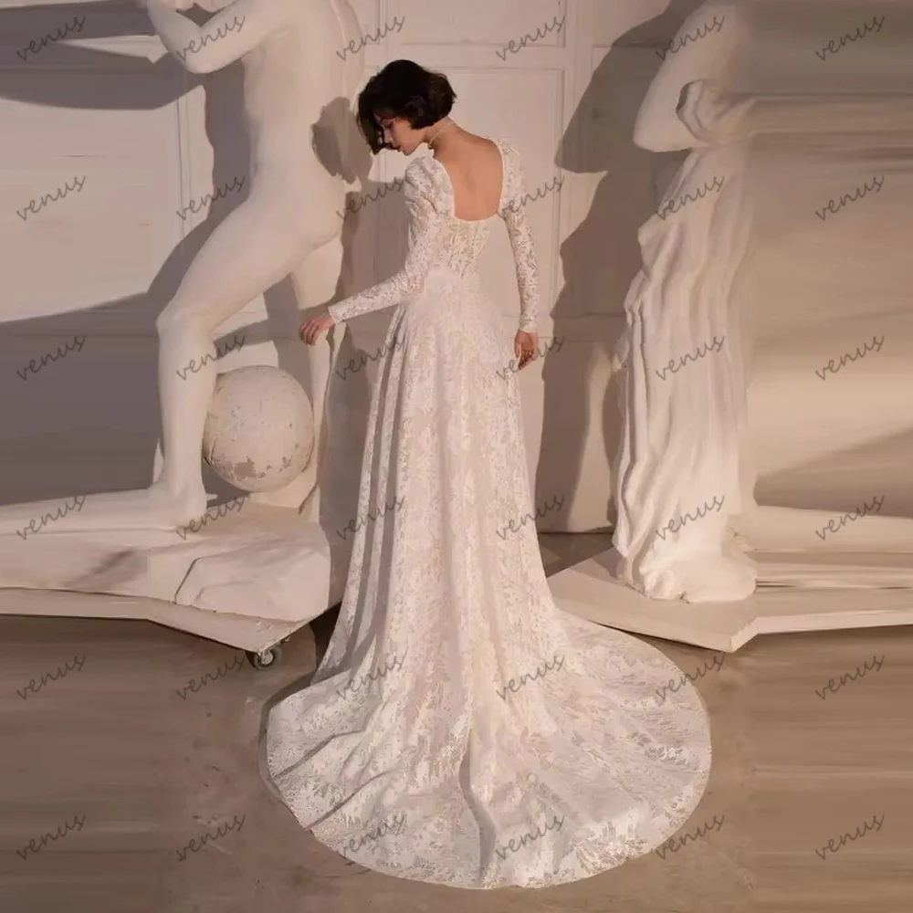 ชุดแต่งงานโบฮีเมียนทรงเอไลน์ ชุดเจ้าสาวลูกไม้แบบมีชั้น แขนยาว ยาวกรอมพื้น สวยงาม ชุดแต่งงานแบบสั่งตัด