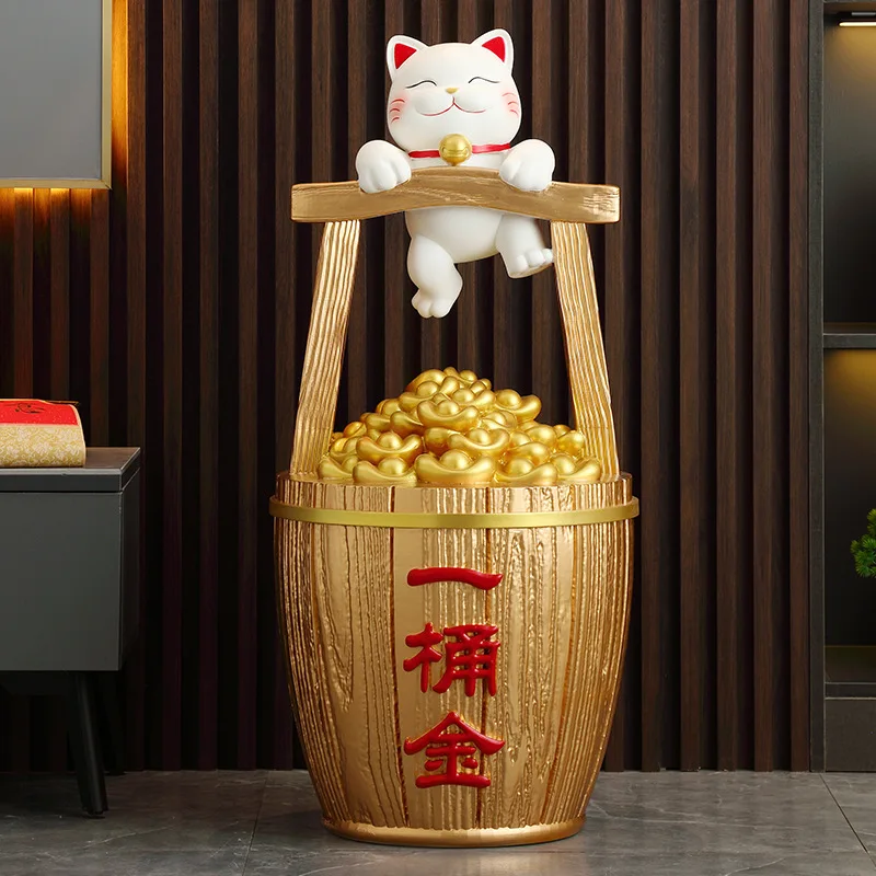 A bucket of gold lucky cat ornaments, opened the front desk store entrance of the company, large floor decoration