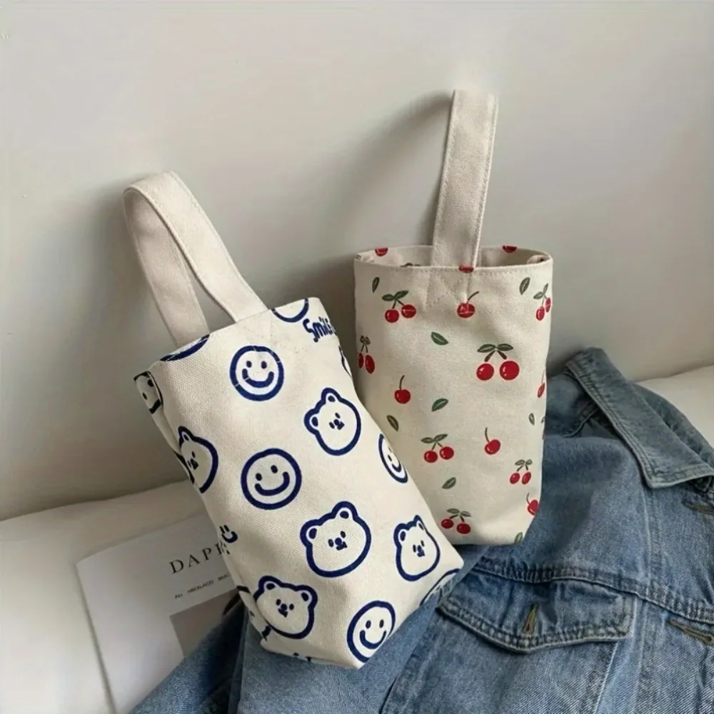 This Cute Floral-Cherry Pattern Tote Bag Is Perfect for Everyday Use and Can Hold a Water Bottle. image 2