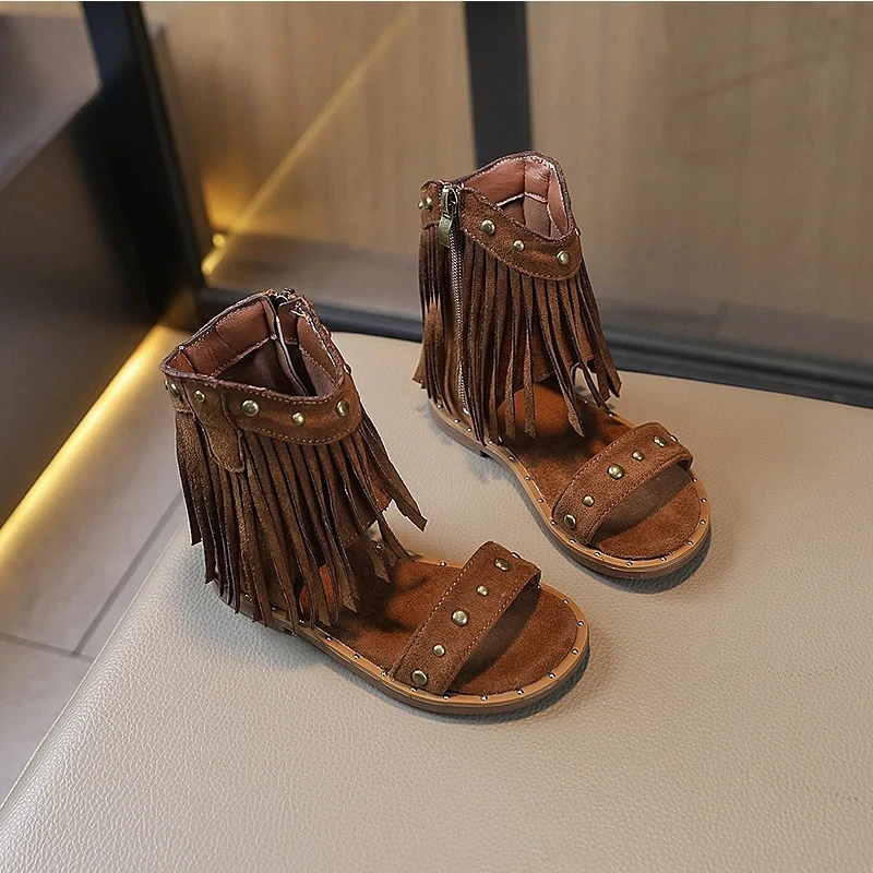 

Классические гладиаторские сандалии с бахромой для девочек, с заклепками и пайетками, на плоской подошве, с кисточками, детские летние модные ковбойские туфли