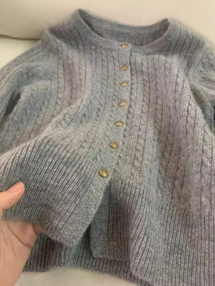 سترات نسائية محبوكة سترات متماسكة تويست بأزرار صلبة وأكمام طويلة ورقبة مستديرة سميكة واحدة الصدر فضفاضة لخريف 2025