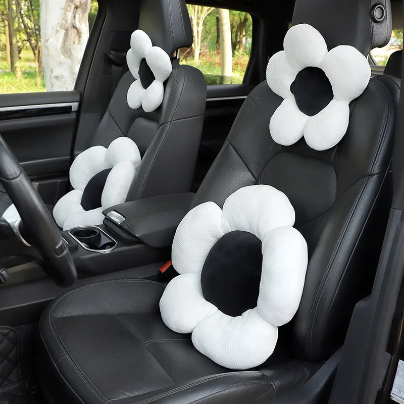 

New car headrests, neck protectors, seat backrests, car cushions, and flower headrests for the driver inside the car
