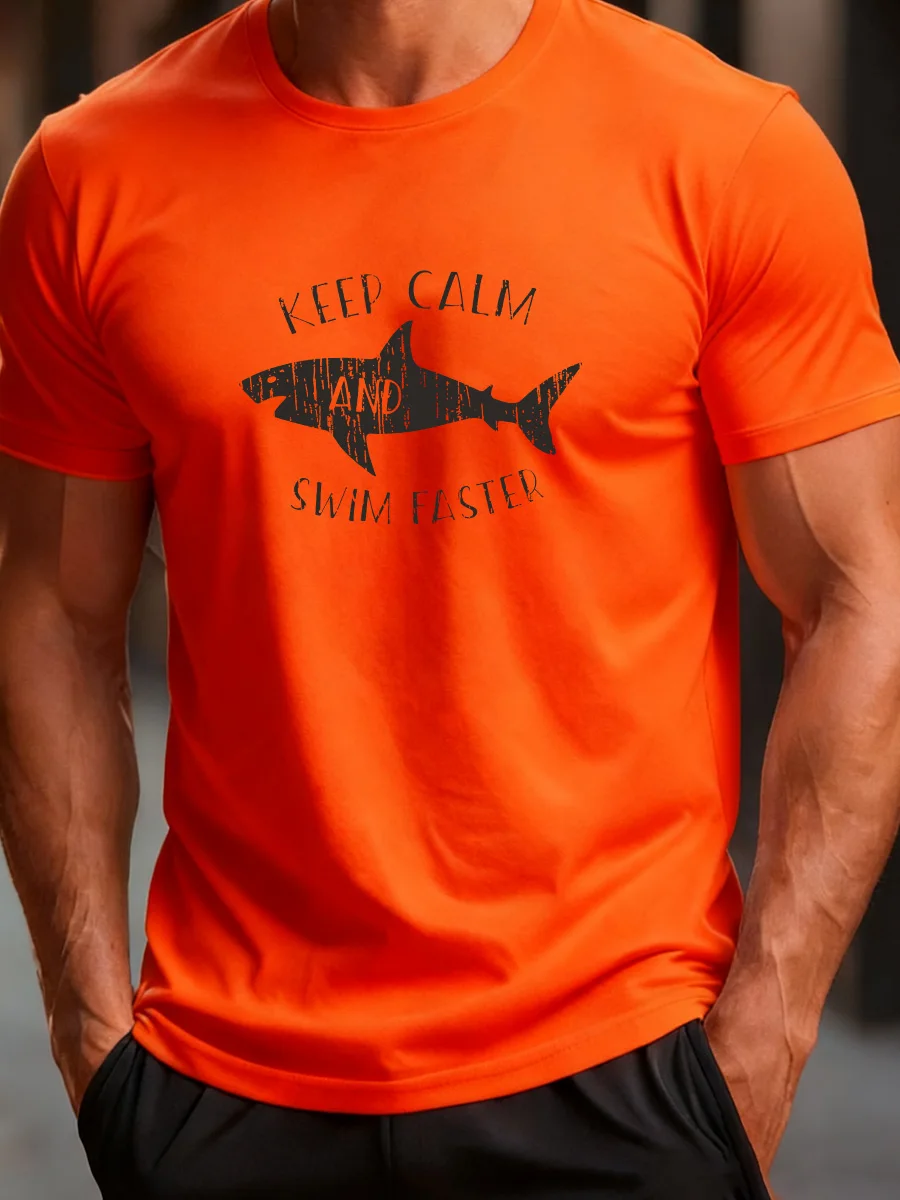 

Orange Short-Sleeve T-Shirt with "Keep Calm and Swim Faster" Shark Graphic