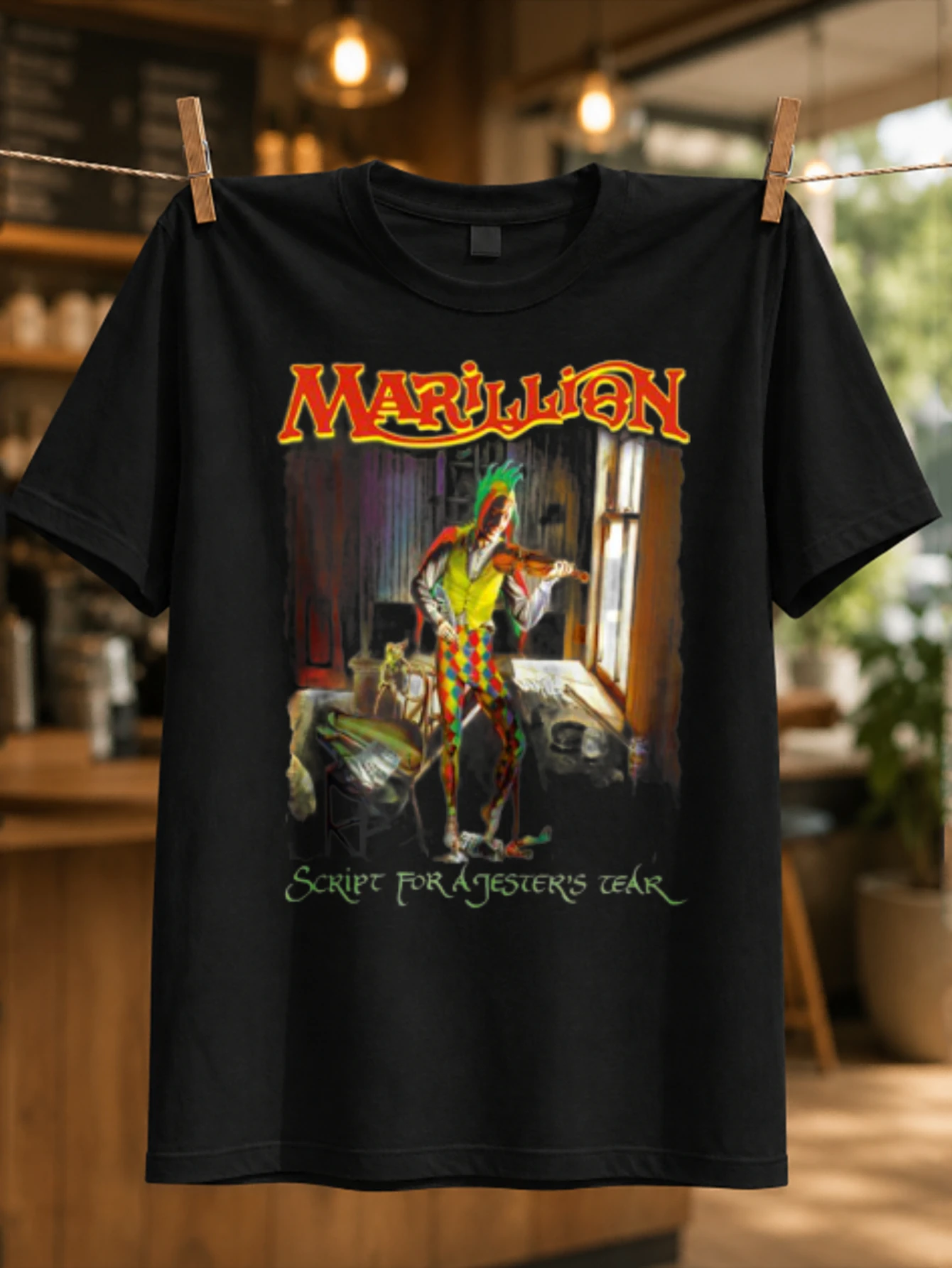 Marillion Script For A Jestes Tear harlequin figure in a room with violin and green title lettering  Unisex All T-Shirt