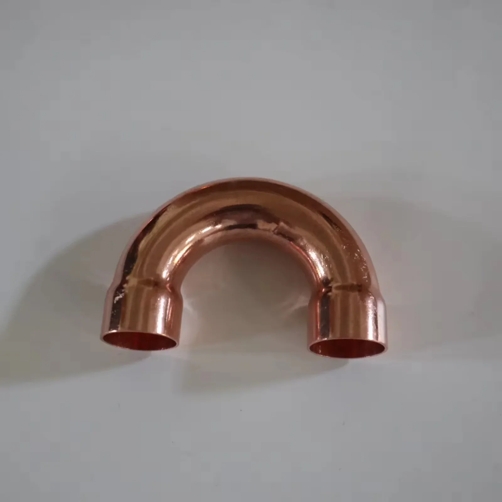 

-For Smooth And Shiny Shape Forging Process Low Price 180 Degree Copper Elbow For Connecting Pipe Applications