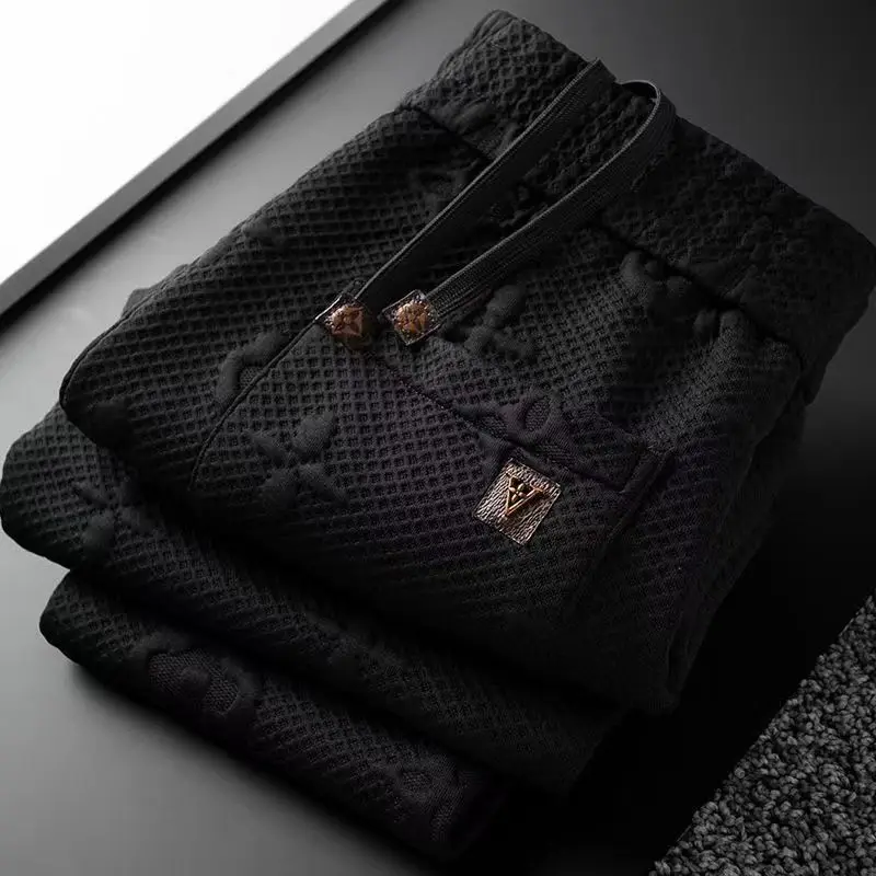 

Autumn High end Light Luxury 3D Jacquard Fashion Trend Men's Slim Fit Sports Closing Waffle Guard Pants Casual Pants