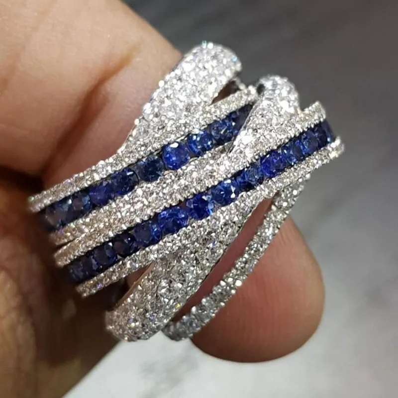 Nuevo anillo brillante de circón blanco y azul europeo y americano, accesorio combinado multicapa estilo palaciego para mujer con líneas