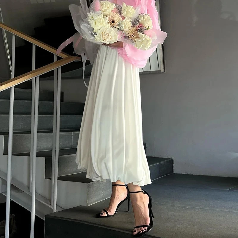 

A-word Big Swing Skirt Female Fashion Design Sense Pleated Bud Temperament Sweet French Temperament Commuting