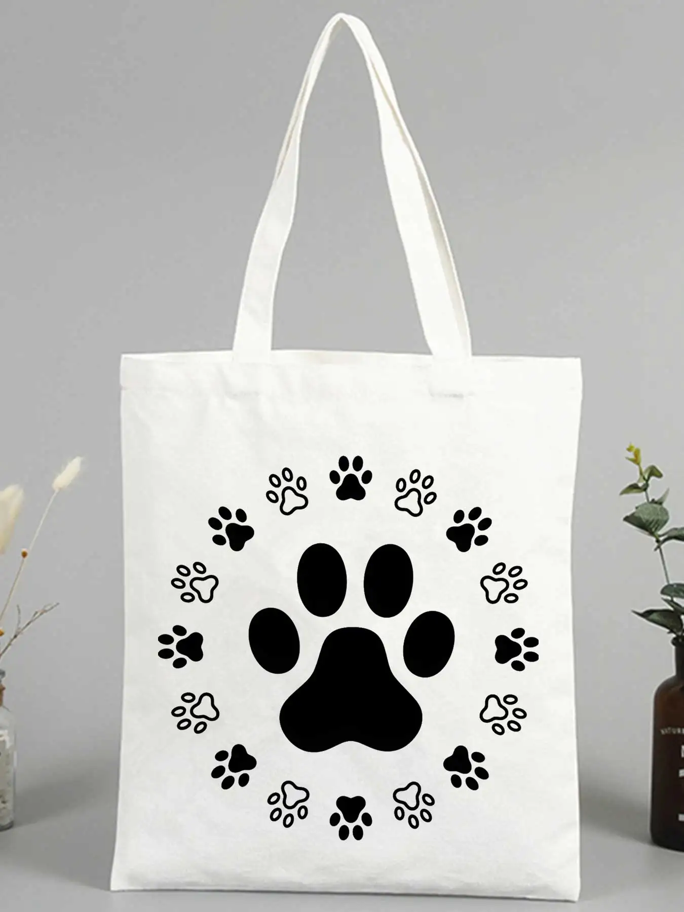 Pet lovers' canvas tote bag with paw print pattern, casual style for daily shopping and outdoor activities