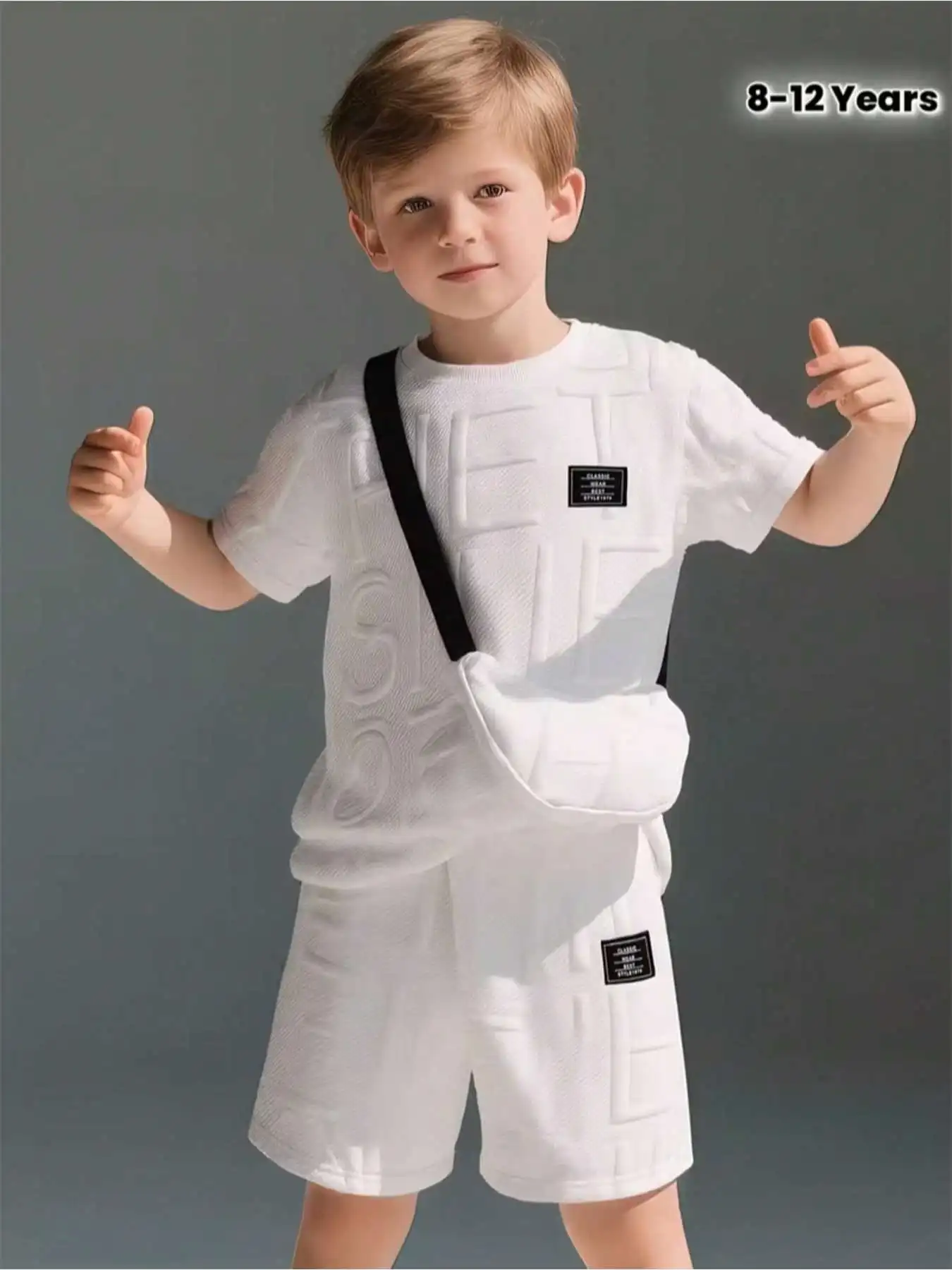 Boys' leisure summer outing two-piece set solid color three-dimensional embossed round neck short sleeved T-shirt+shorts set