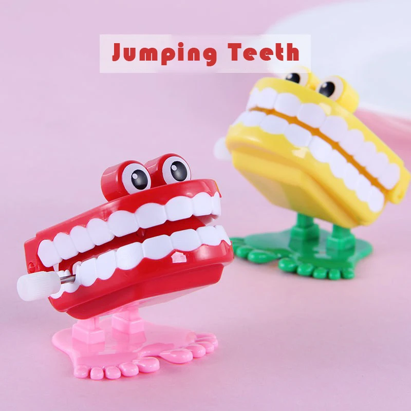 

1Pcs Cute Kids Fun Toys Clockwork Toy Upper Chain Jumping Tooth Toy Children Jump Teeth Running Clockwork Spring Wind Up Toy