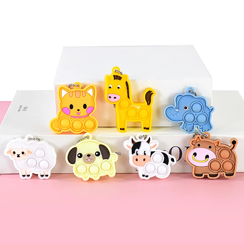 Mini llavero de dibujos animados de 7 piezas para niños, juguetes sensoriales Kawaii para aliviar el estrés, perro, gato, elefante