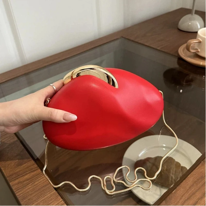

Curved Pebble Shape Clutch Bag Fashion Chain Luxury Mini Evening Purse for Women 2026 New Unique Cute Chic Party Handbag Woman
