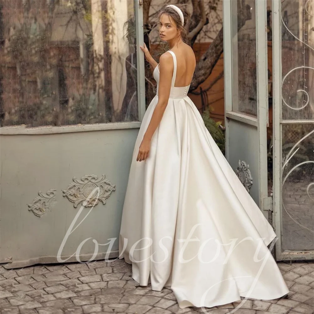 

Elegant A Line Satin Wedding Dresses With Pockets Sexy Openback Bridal Gowns Women Floor Length Bride Robes Vestidos De Novia