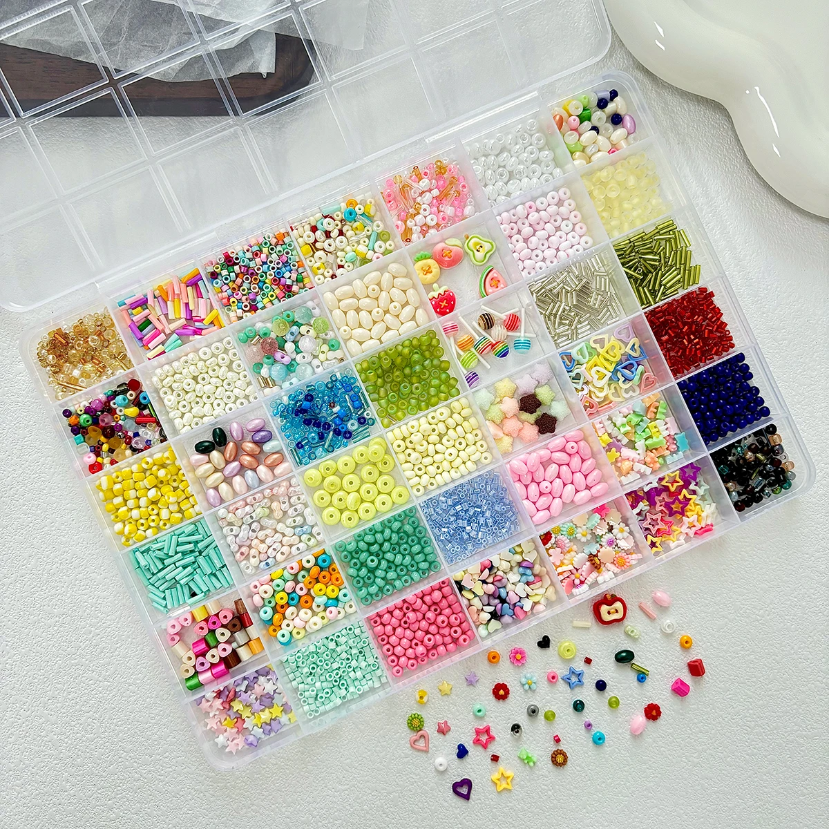 1Box-42 Grids Macaron Colored Creative Candy Bow Resin Nail Art Decorations Novelty Realistic Star Beads Hybrid Nail Charms DIY