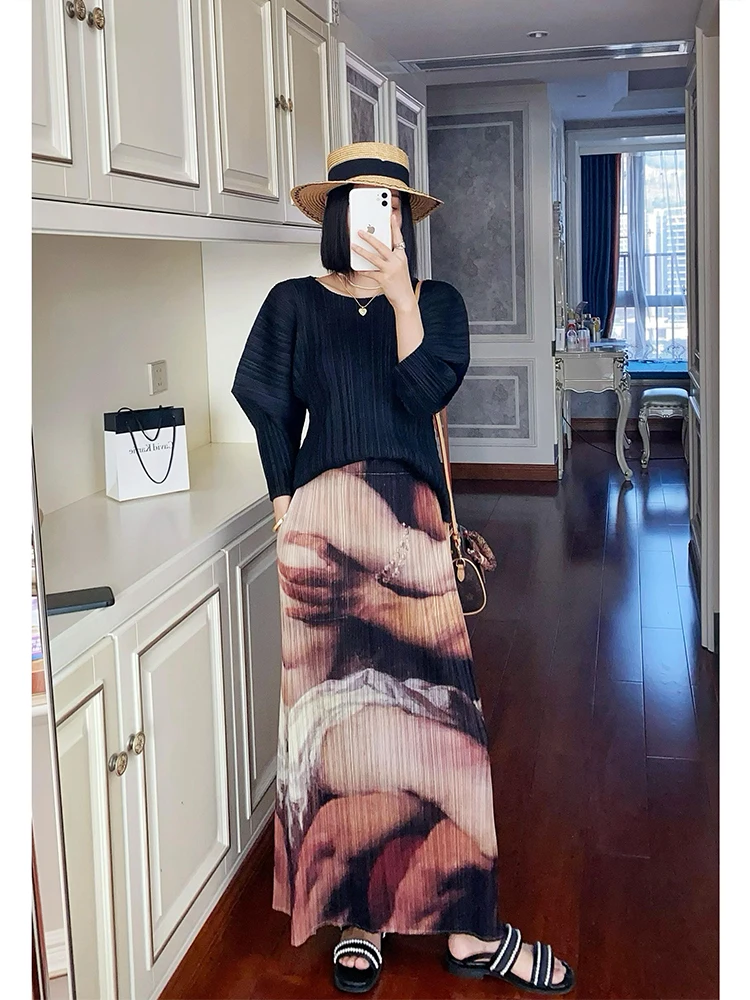 Vrouwen bedrukte halve rok 2025, zomer nieuwe hoge taille, casual losse grote maat stretch casual mode vrouwelijke halve rok