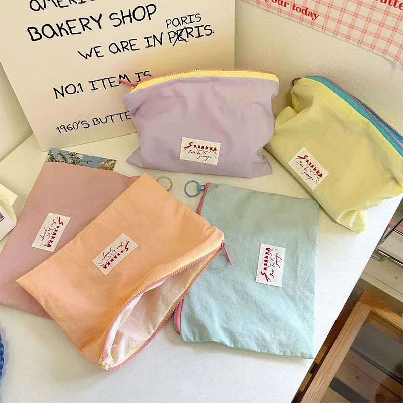 Macaron tas riasan warna kontras, tas penyimpanan portabel multifungsi, sederhana dan modis