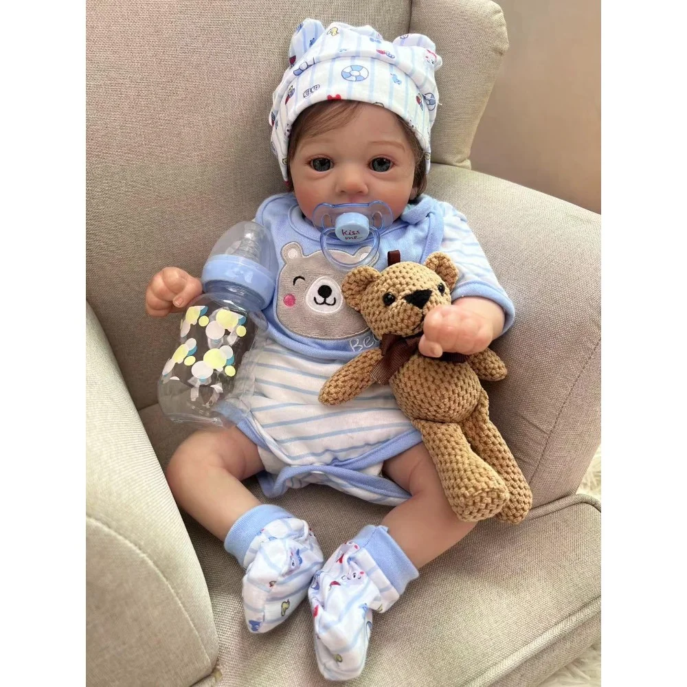 

18 inch Realistic Reborn Baby Doll Girl The Look Real Brown Hair Blue Eyes Soft Body with Blue Clothes for Kids Birthday Gift