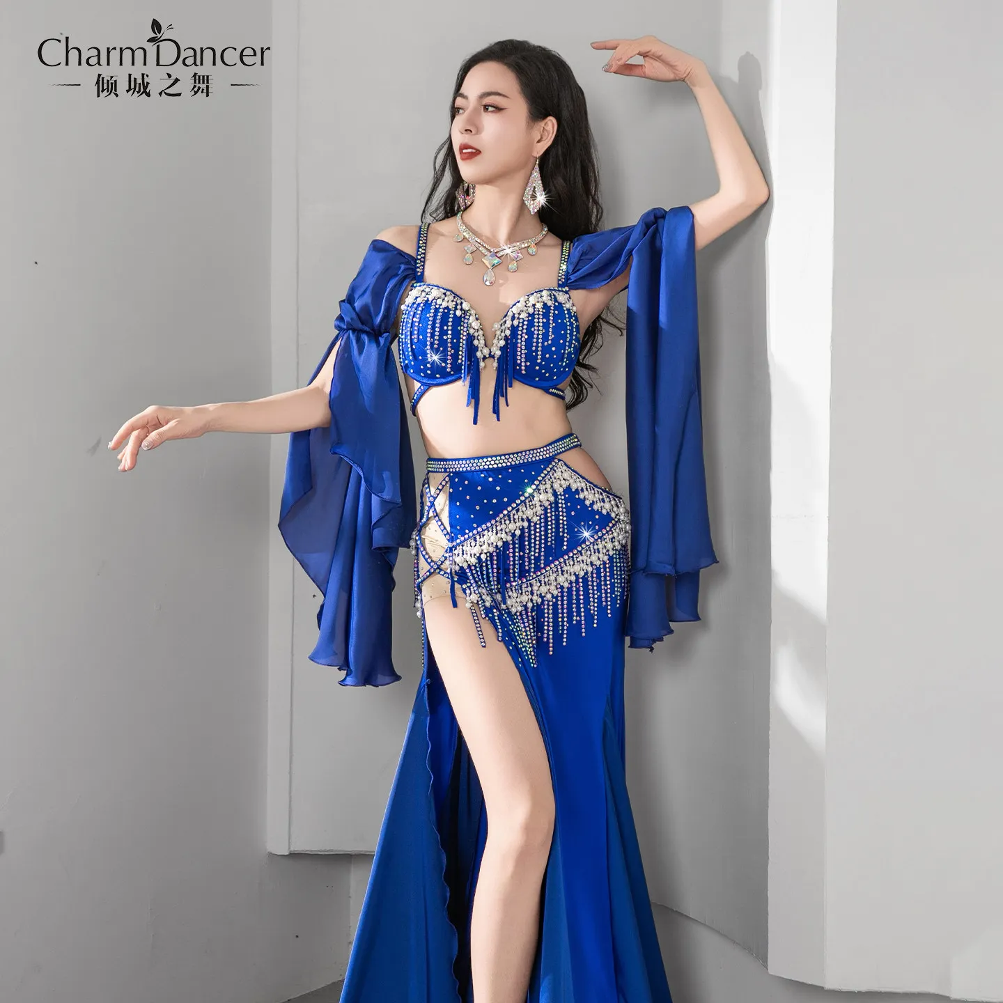 Qingcheng Dance's new belly dance performance costume, featuring intricate pearl and tassel embellishments, is perfect for