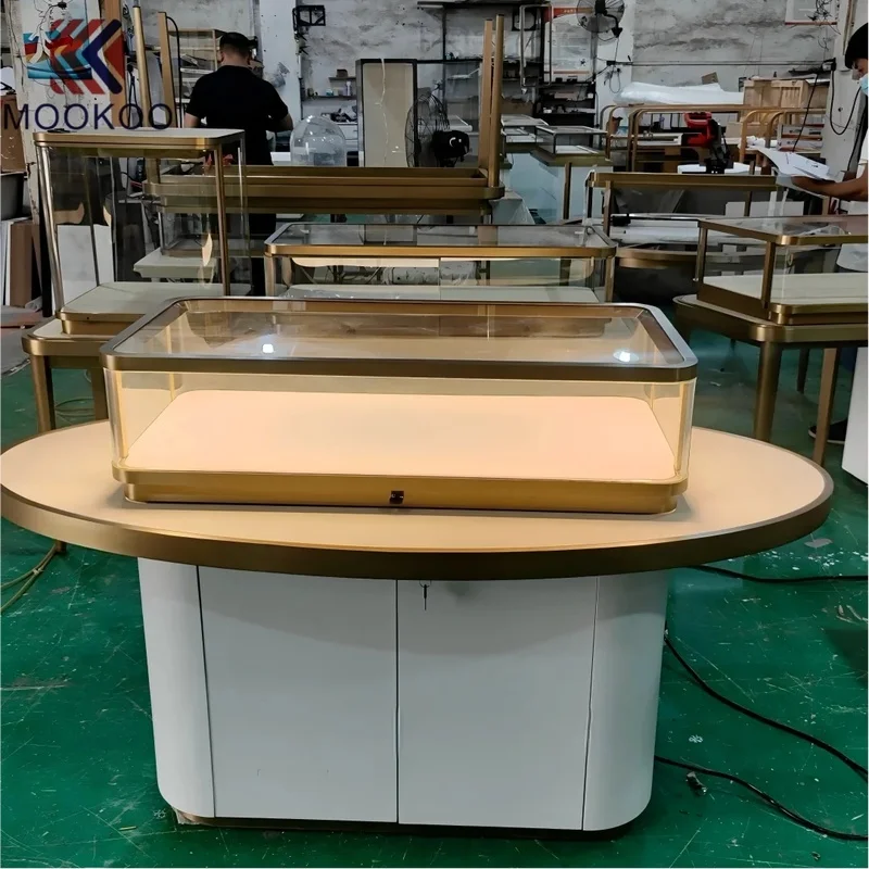 custom.Luxury Gold Stainless Steel Oval Jewelry Display Table Tempered Glass Jewellery Showcase with LED Light