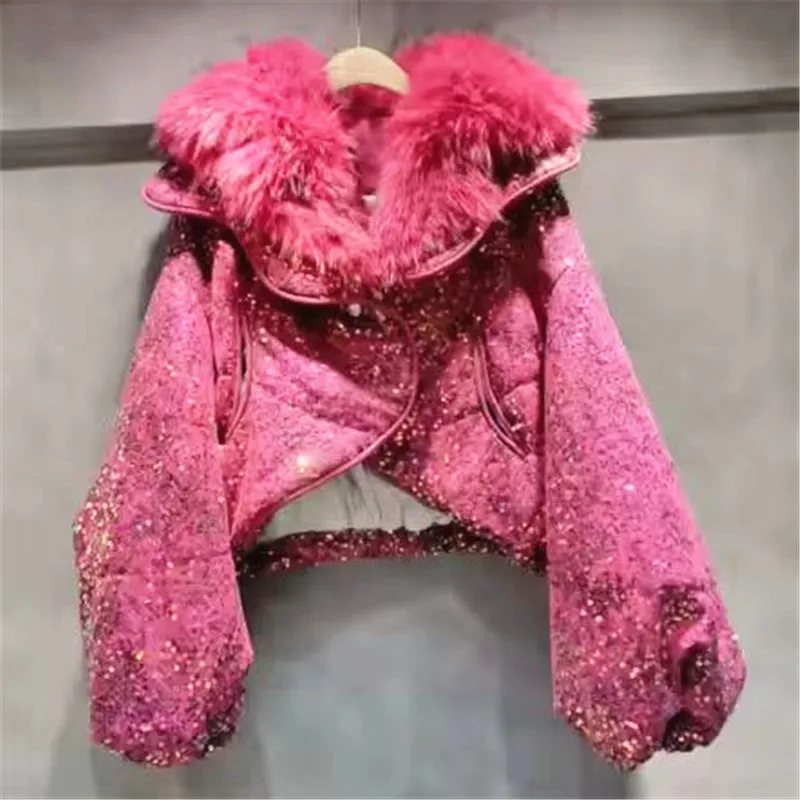 

Glam 2025 Winter: Sparkly cropped coat with a luxe fur collar & chic puff sleeves. Stay warm in style.