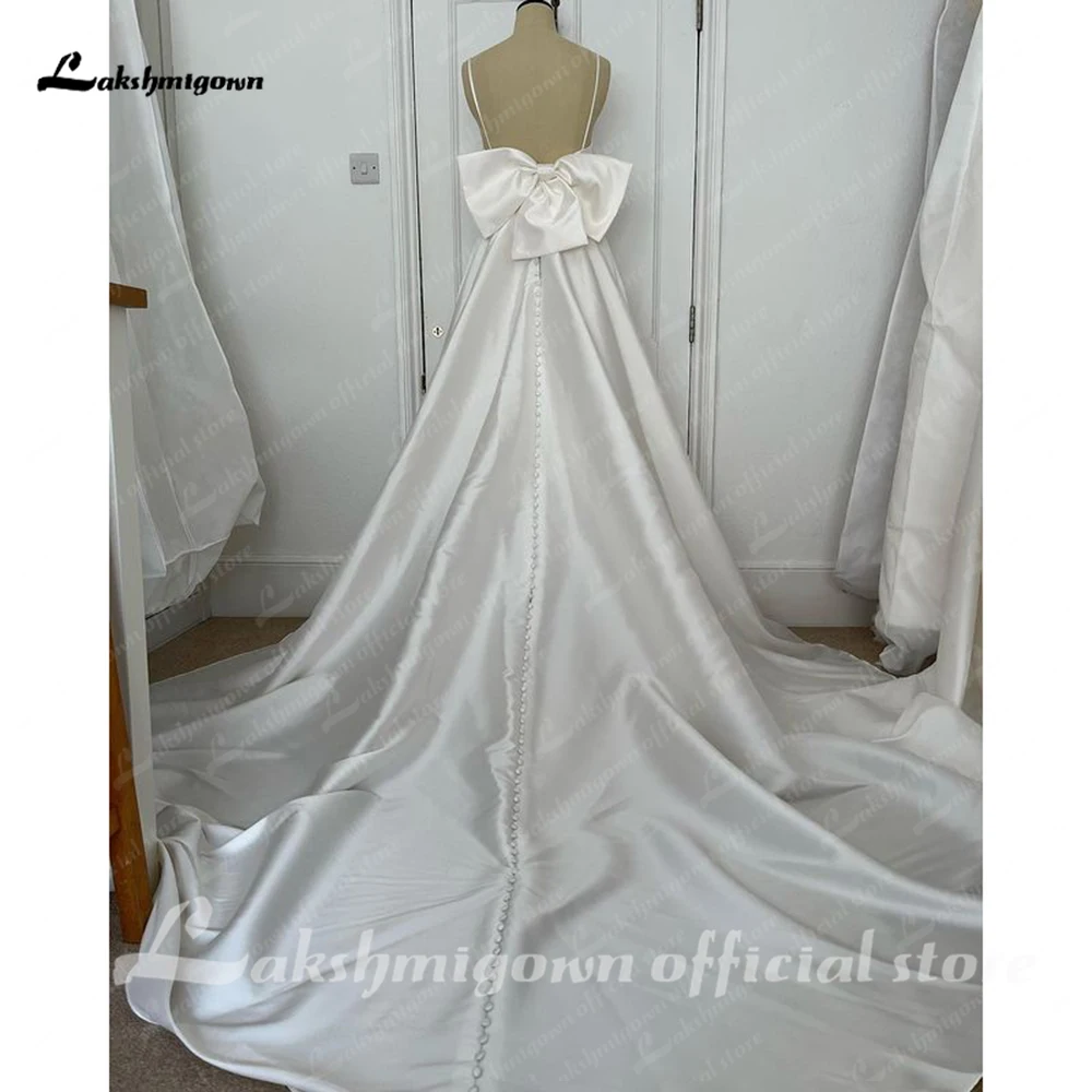 Gaun pernikahan Satin gaun pengantin lakshmidrn disesuaikan tali Spaghetti gaun pesta panjang-mencapai lantai dengan busur Vestido de novias