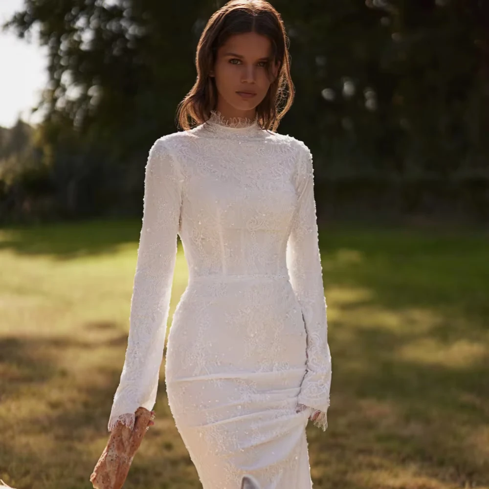 ชุดแต่งงานลูกไม้สีขาวแบบคลาสสิกประดับลูกปัดสำหรับเจ้าสาว คอสูง แขนยาว ทรงเมอร์เมด หรูหรา