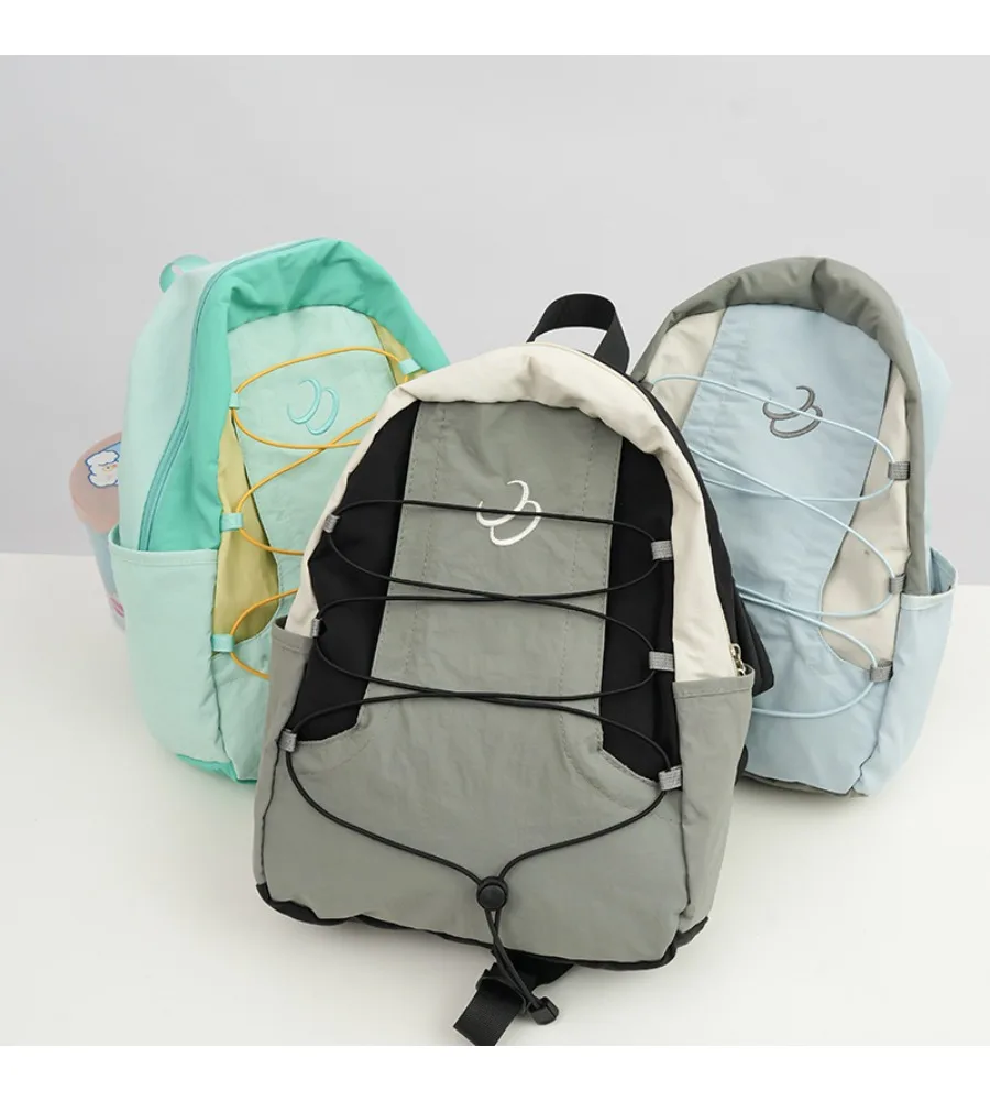 Niche color matching backpack women's sports travel backpack junior high school student schoolbag tide