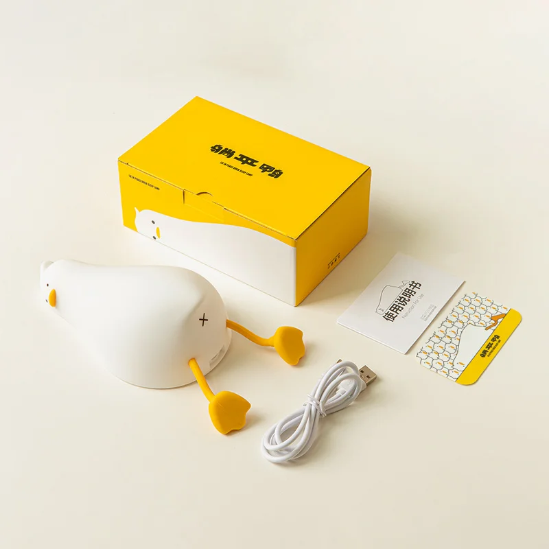 Lying Flat Duck Night Light Silicone Squishy Rechargeable Tap Control 3 Brightness 30 Min Timer Phone Holder for Bedside view 6