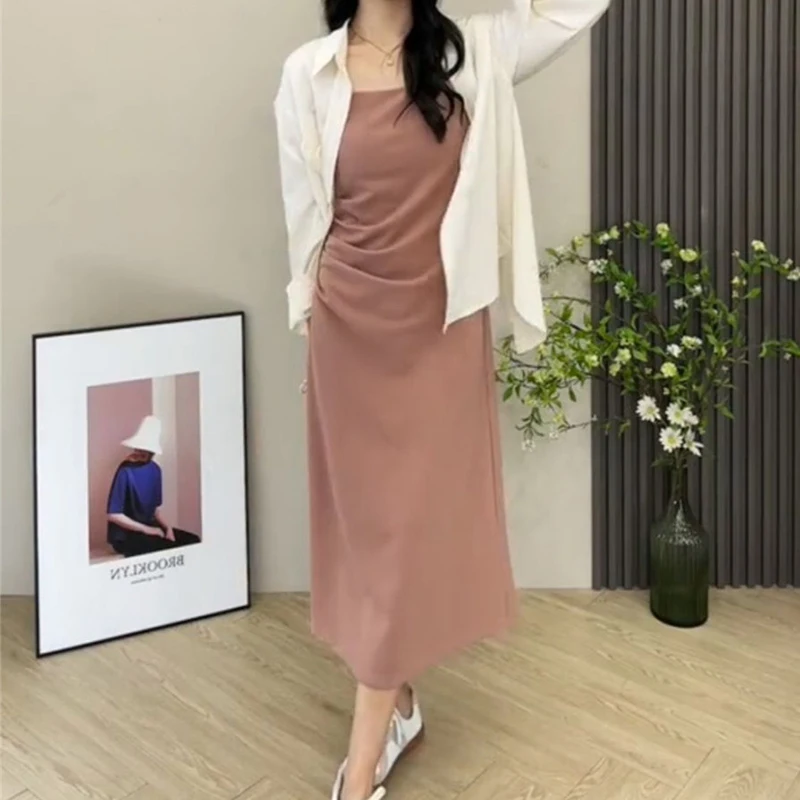 Dress-in-shoulder suit women's new fashion temperament with slit shirt behind it, women's long design and two-piece suit.