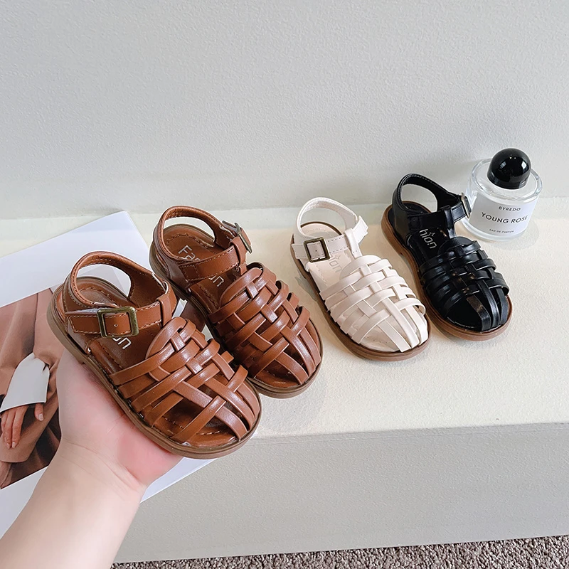 

Girls Roman Sandals Antiskid Soft-soled Leather Sandals Woven Hollow Out Girls Boy Leisure Shoes Rome 2024 Summer Beach Shoes