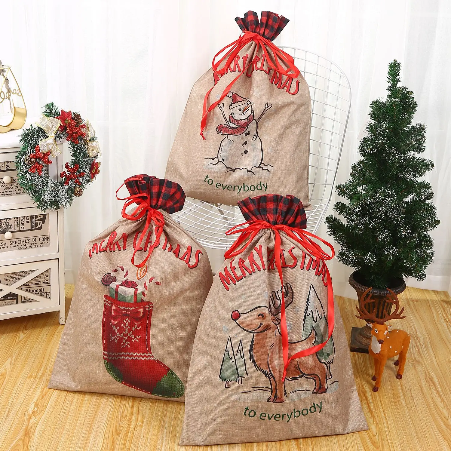 2025 New Arrival Large Capacity 50*70cm / 20*27inches Big Christmas Gift Packaging Santa Claus Linen Drawstring Bags Pouches