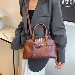 Nuevo bolso de cuero de diseñador de marca, bolso pequeño Retro marrón de sensación de gama alta, bolso cruzado versátil para mujer, bolso de mano súper Popular, bolso de concha