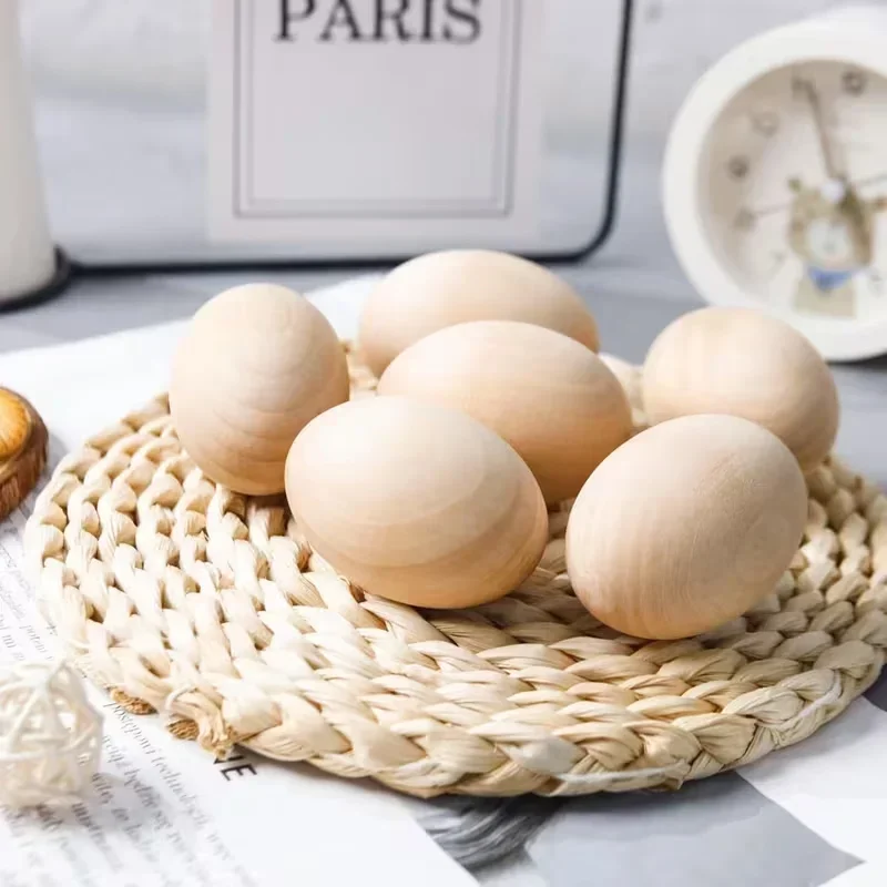 

Большие и маленькие неокрашенные деревянные яйца для поделок, пасхальных украшений и весеннего декора