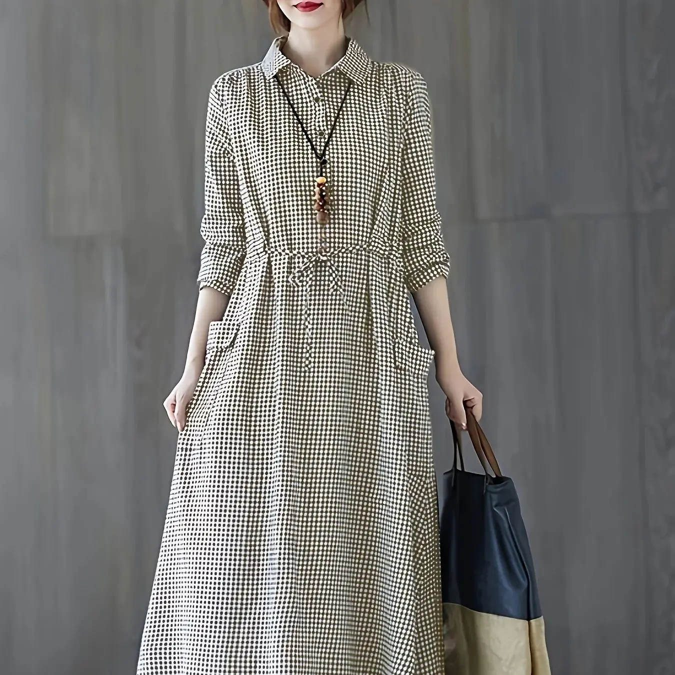 Black and white small plaid flip tie button waist closure large pocket long sleeved dress