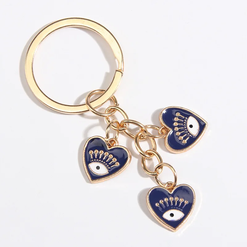 2025 New Heart Shaped Palm Water Drop Devil's Eye Pendant Suitable for Men and Women Accessories Keychain Keychain Holiday Gift - Image 2
