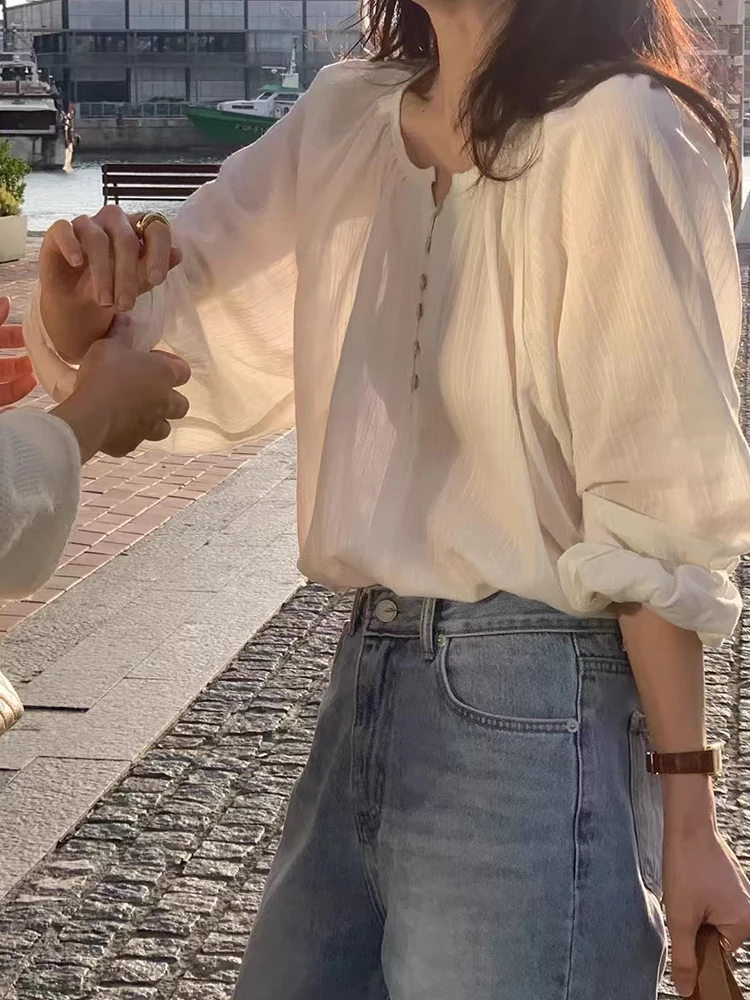 Chic Spring Gentle Wind round Ne ell Button Design Texture Loose Casual Long Sve Women's irt Korean Sle Bubble Sve