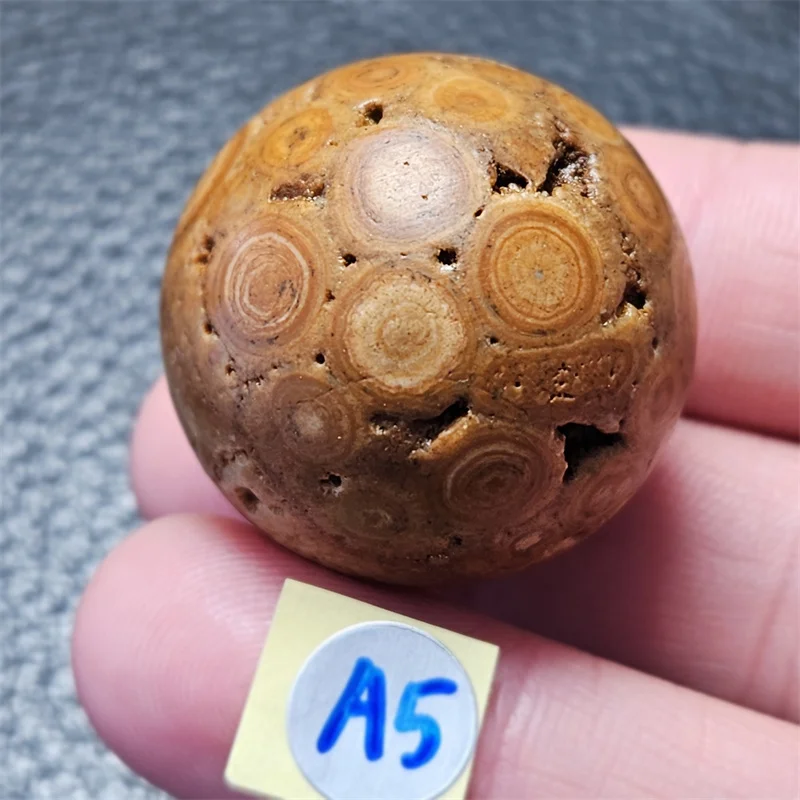 

30mm Natural brownish-yellow ocean jade eye ball energy crystal healing desk decoration palm toy