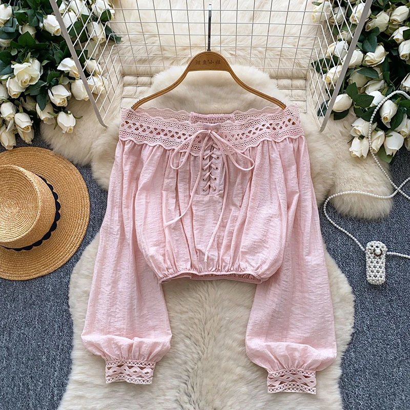 Design sense off shoulder long sleeved shirt women in spring new lace-up lace splicing and waist cinching short style top