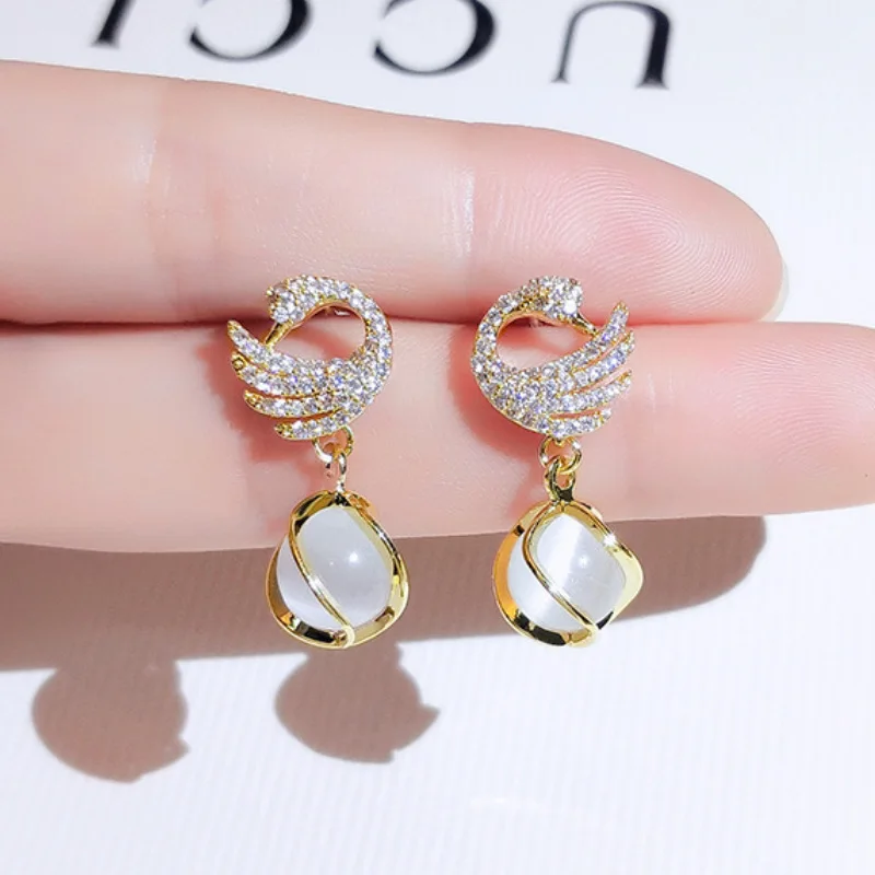 925 Silver Needle Fashion Noble Sparkling Crystal Swan Earrings For Women Korean Cat\'s Eye Stone Drop Earrings 2026 Trendy New