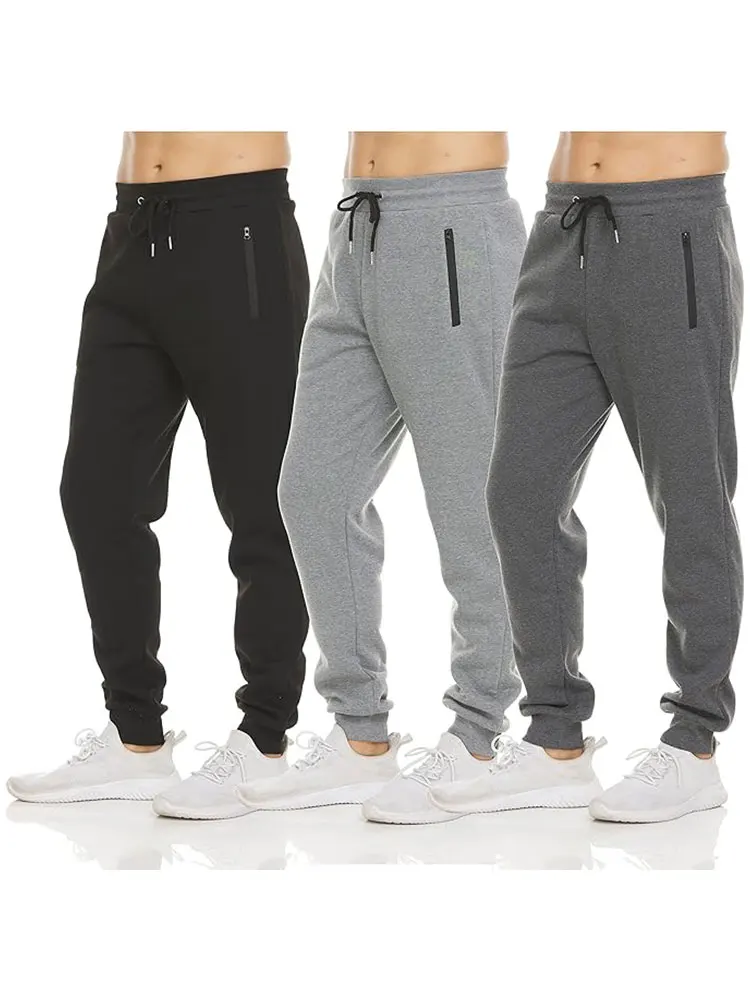 

Мужские флисовые спортивные спортивные штаны для бега из 3 комплектов с карманом на молнии и шнурком. Удобные спортивные штаны для активного отдыха.