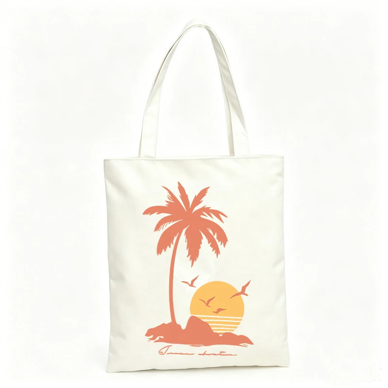 Women's palm tree and sunset print canvas tote bag, retro style for beach outings and summer shopping