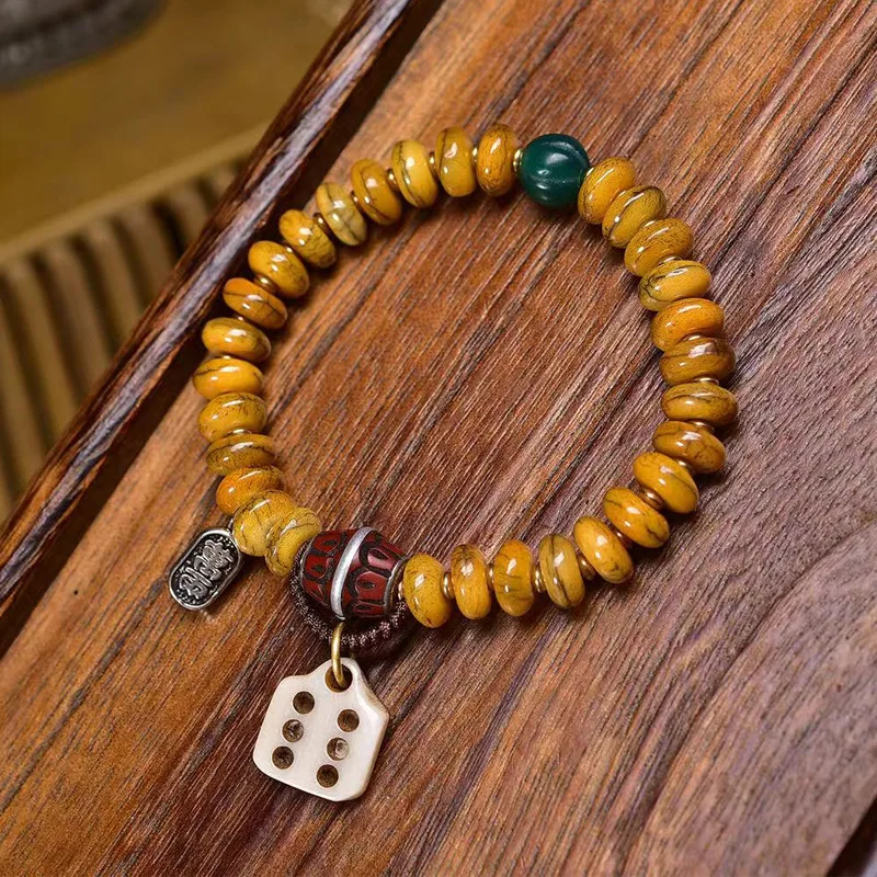 

Tibetan-style Yak Bone Bead Bracelet with Green Agate and Inuwa Turquoise Accessories
