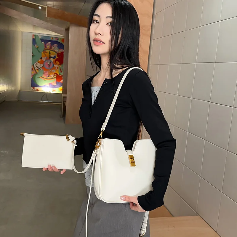 

2025 Новинка! Легкая роскошная сумка-ведро Arc de Triomphe Hobo | Высококачественная простая конструкция замка | Через плечо из овчины/подмышек